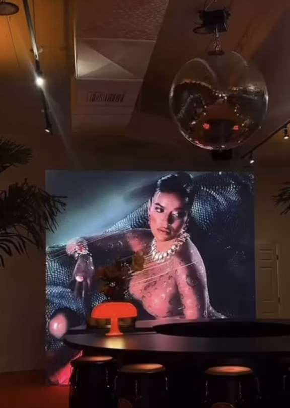 Mirrored disco ball effect creating reflective dance floor lighting